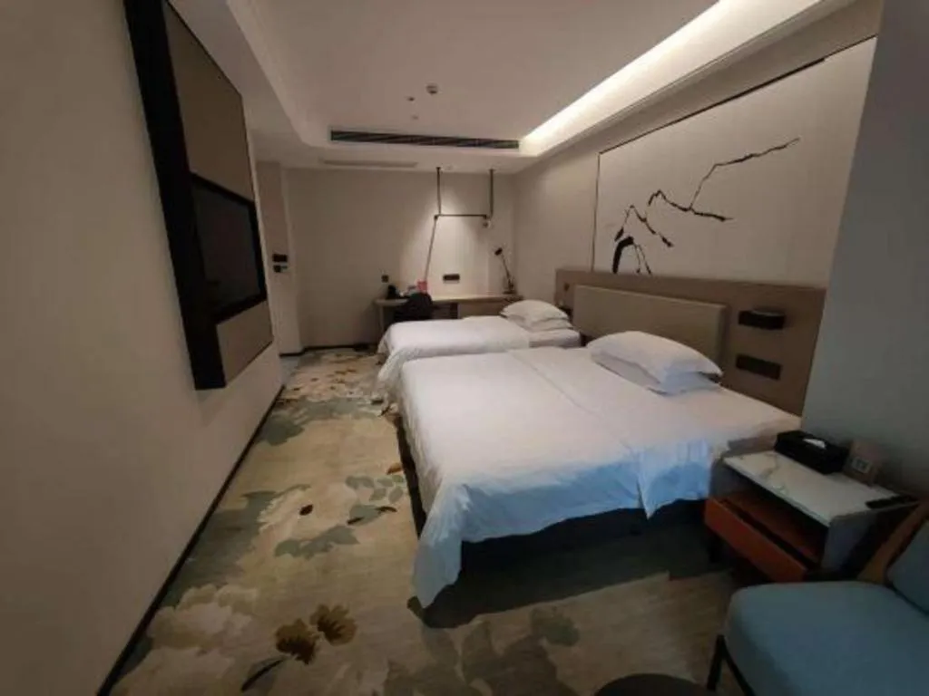 Bed in GreenTree Eastern Chongqing Yangjiaping Pedestrian Street Mixc Hotel