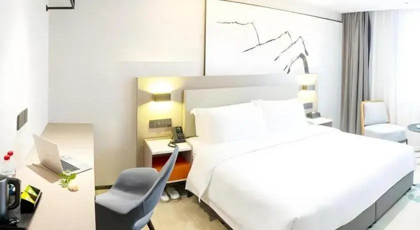 Bed in GreenTree Eastern Chongqing Yangjiaping Pedestrian Street Mixc Hotel Bed in GreenTree Eastern Chongqing Yangjiaping Pedestrian Street Mixc Hotel