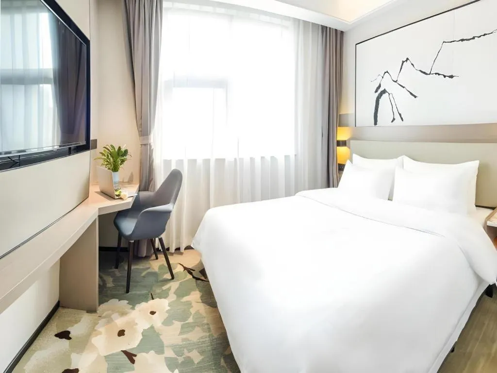 Bed in GreenTree Eastern Chongqing Yangjiaping Pedestrian Street Mixc Hotel