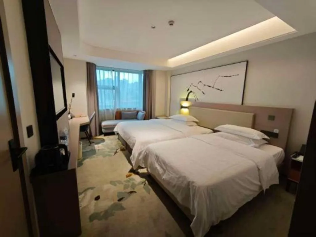 Bed in GreenTree Eastern Chongqing Yangjiaping Pedestrian Street Mixc Hotel