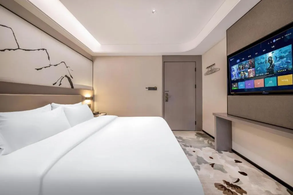 Bed in GreenTree Eastern Chongqing Yangjiaping Pedestrian Street Mixc Hotel