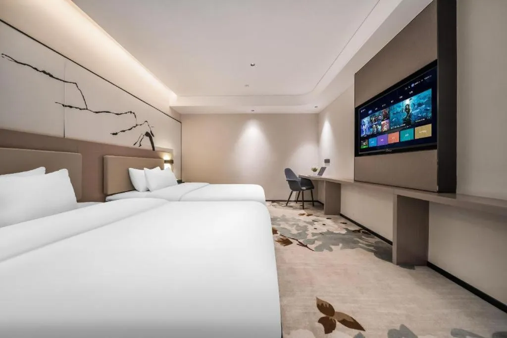 Bed in GreenTree Eastern Chongqing Yangjiaping Pedestrian Street Mixc Hotel
