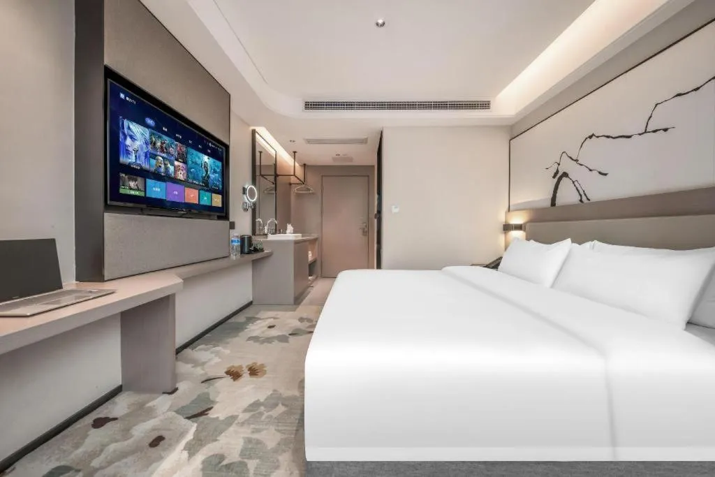 Bed in GreenTree Eastern Chongqing Yangjiaping Pedestrian Street Mixc Hotel