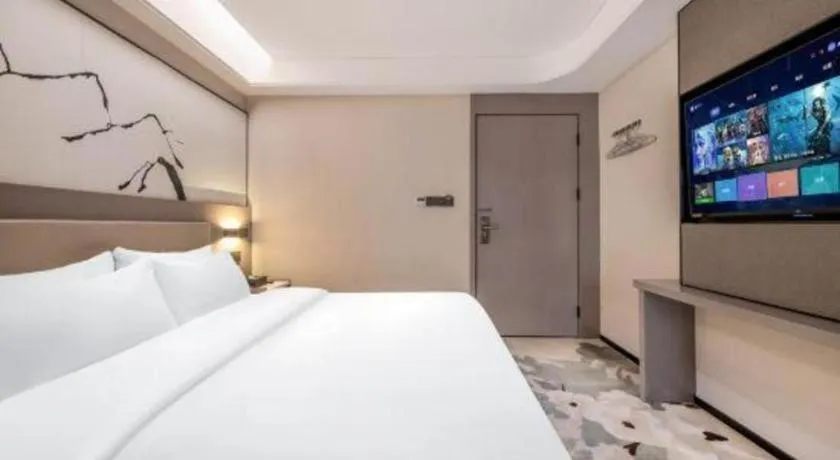 Bed in GreenTree Eastern Chongqing Yangjiaping Pedestrian Street Mixc Hotel