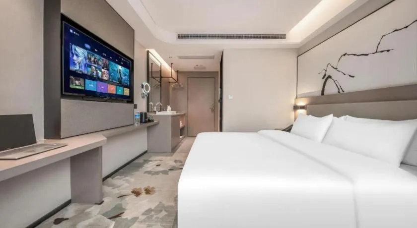 Bed in GreenTree Eastern Chongqing Yangjiaping Pedestrian Street Mixc Hotel