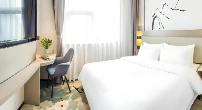 Bed in GreenTree Eastern Chongqing Yangjiaping Pedestrian Street Mixc Hotel