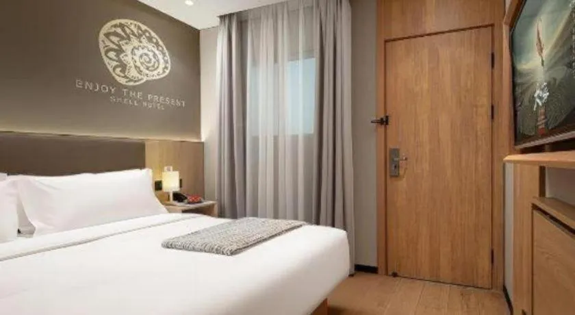 Bed in Shell Hotel Beijing Shunyi District Shunyi Metro Station