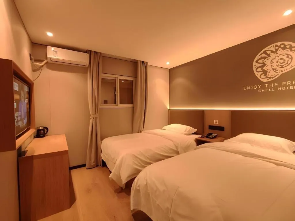 Bed in Shell Hotel Beijing Shunyi District Shunyi Metro Station
