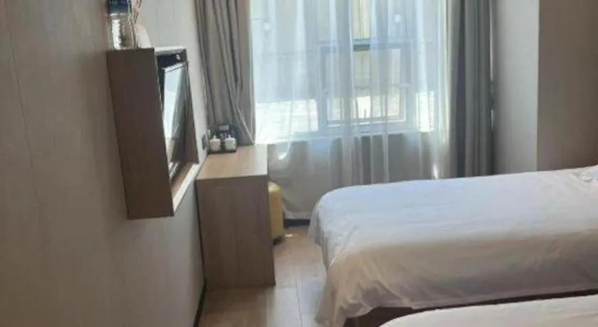 Bed in Shell Hotel Beijing Shunyi District Shunyi Metro Station