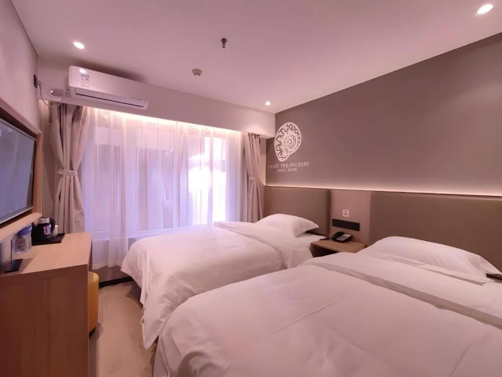 Bed in Shell Hotel Beijing Shunyi District Shunyi Metro Station