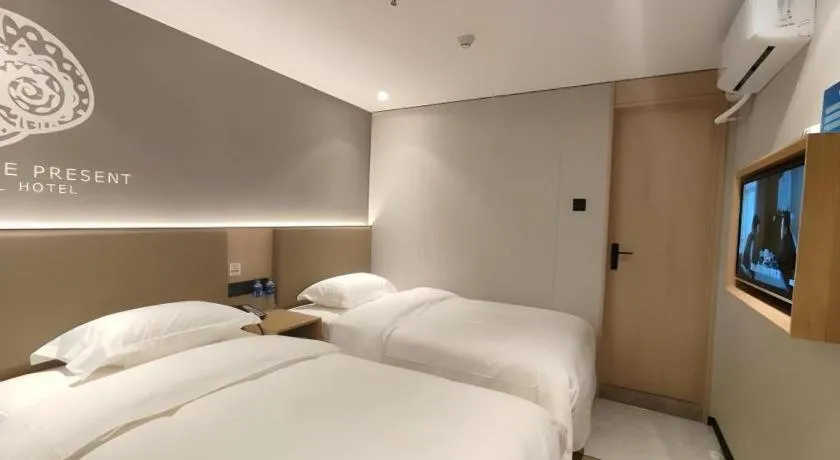 Bed in Shell Hotel Beijing Shunyi District Shunyi Metro Station