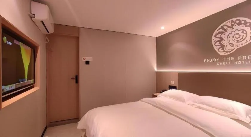 Bed in Shell Hotel Beijing Shunyi District Shunyi Metro Station