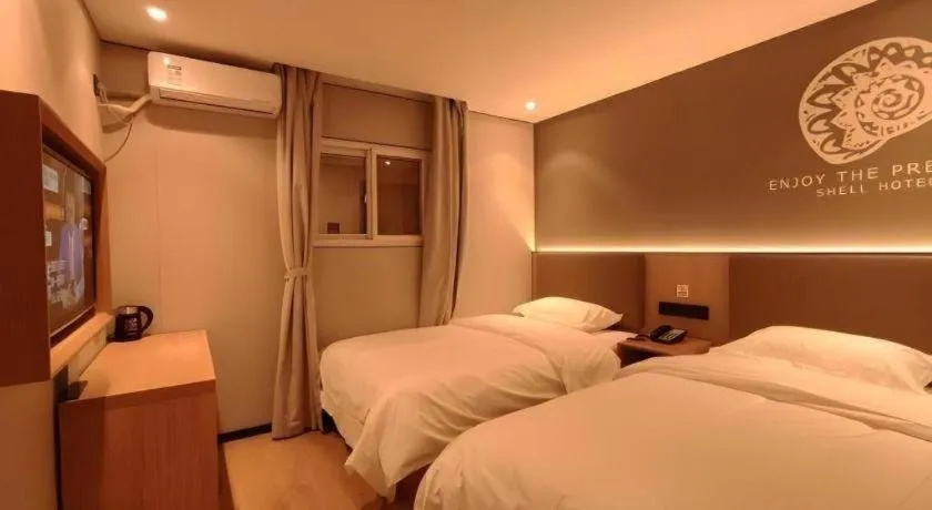 Bed in Shell Hotel Beijing Shunyi District Shunyi Metro Station