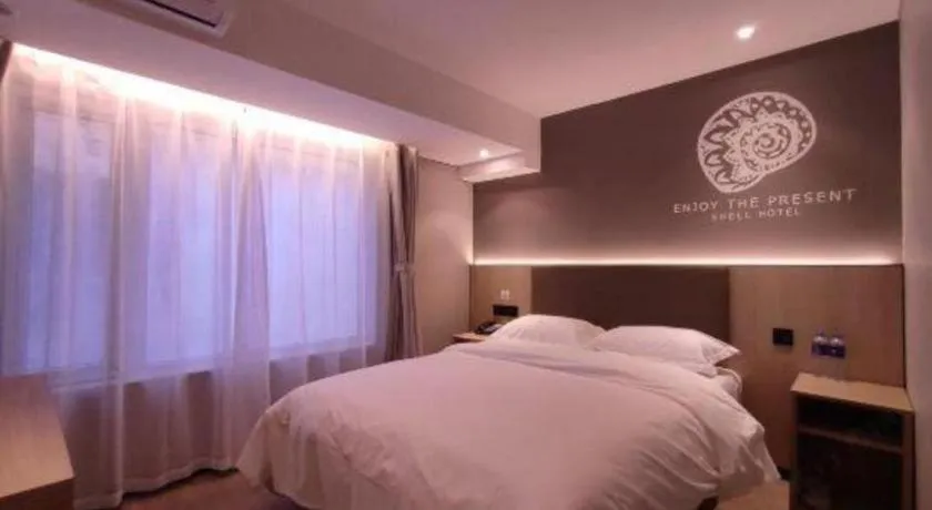 Bed in Shell Hotel Beijing Shunyi District Shunyi Metro Station
