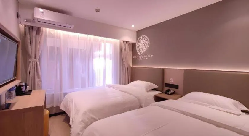 Bed in Shell Hotel Beijing Shunyi District Shunyi Metro Station