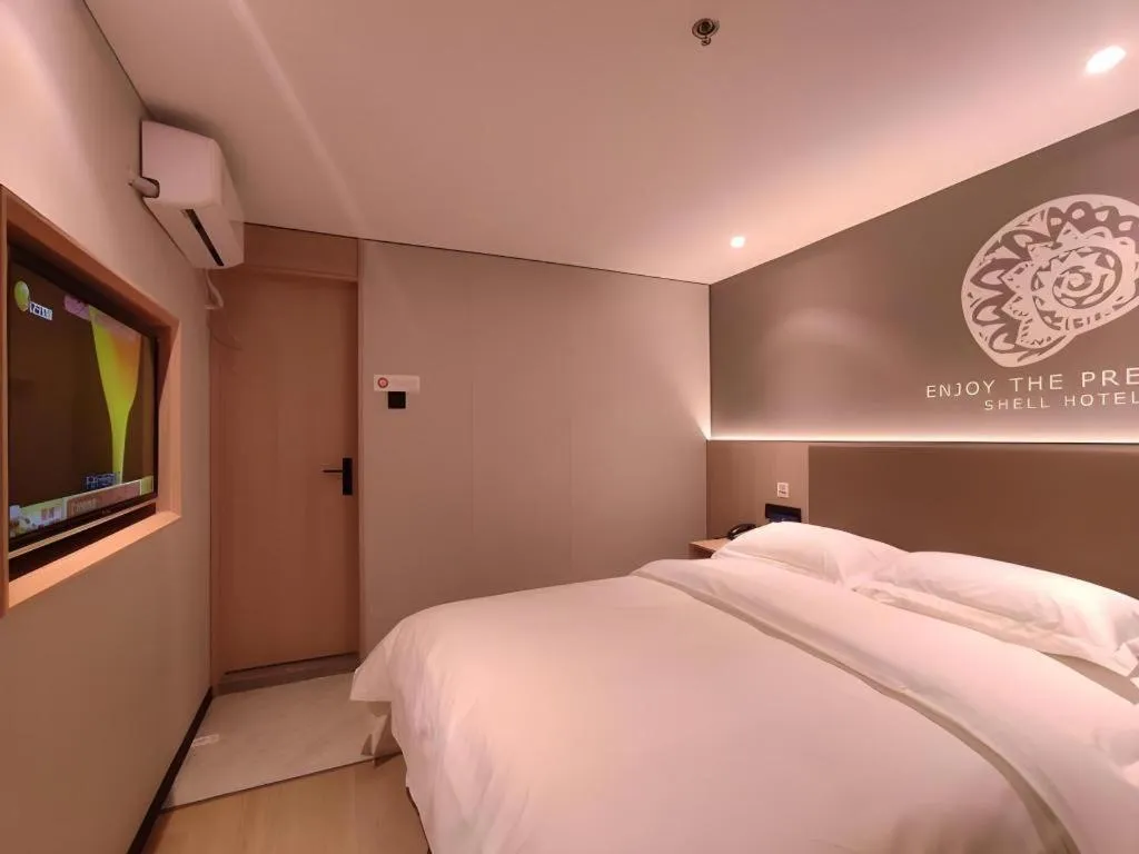 Bed in Shell Hotel Beijing Shunyi District Shunyi Metro Station