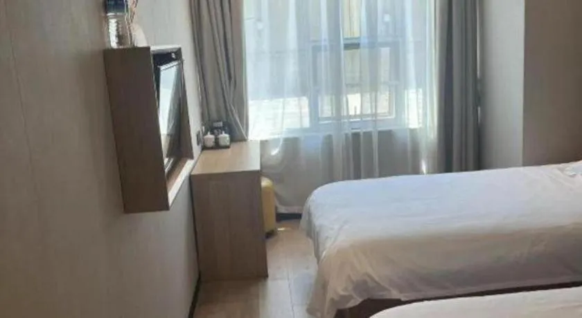 Bed in Shell Hotel Beijing Shunyi District Shunyi Metro Station