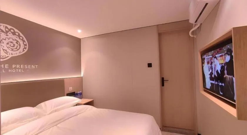 Bed in Shell Hotel Beijing Shunyi District Shunyi Metro Station
