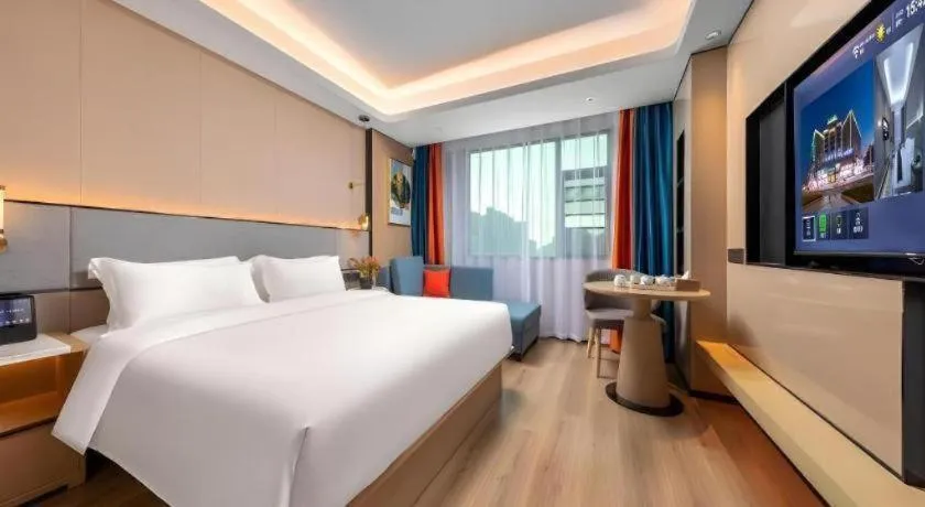 Bed in Gya Hotel Zhuhai International Airport New Town