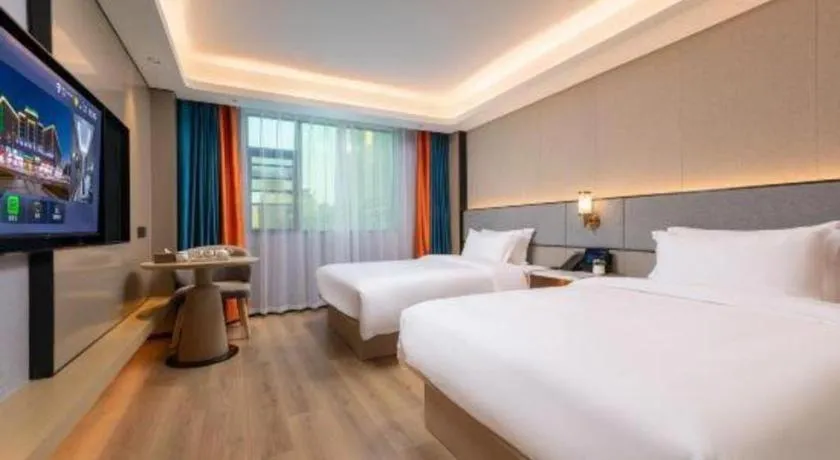 Bed in Gya Hotel Zhuhai International Airport New Town