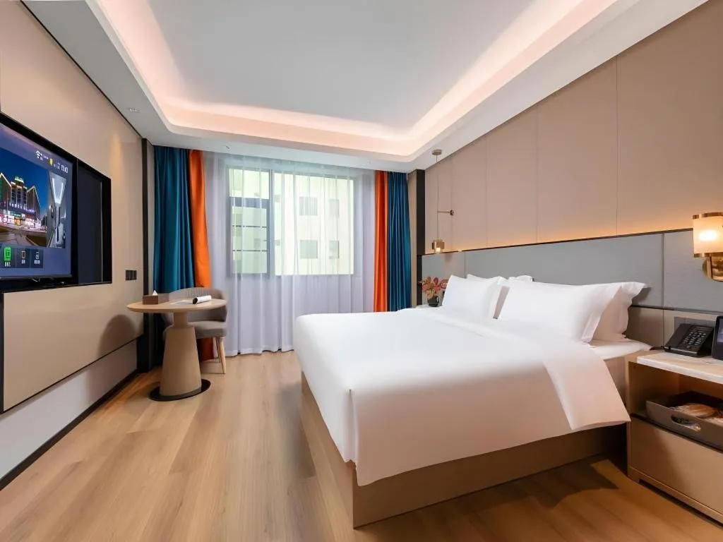 Bed in Gya Hotel Zhuhai International Airport New Town
