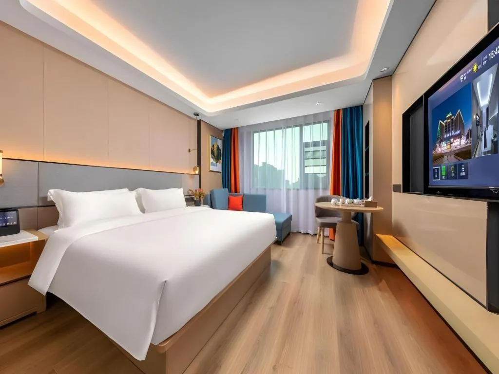 Bed in Gya Hotel Zhuhai International Airport New Town