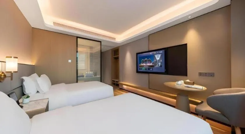 Bed in Gya Hotel Zhuhai International Airport New Town