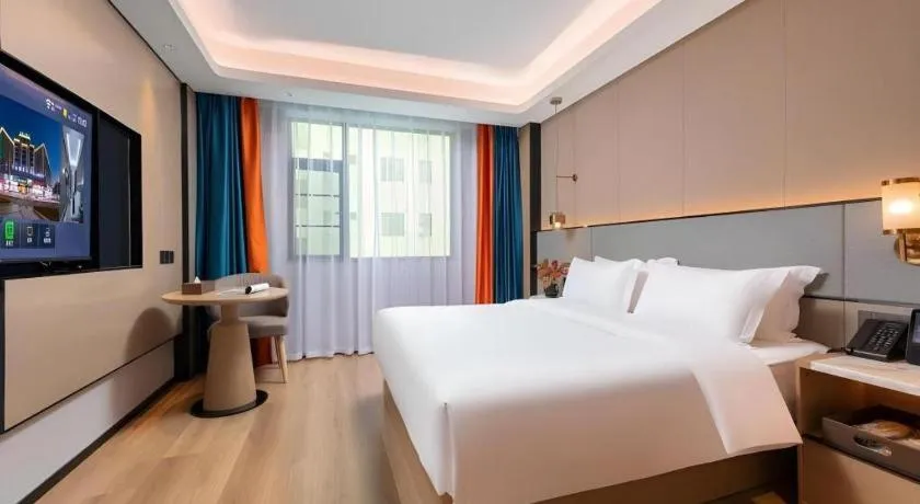 Bed in Gya Hotel Zhuhai International Airport New Town