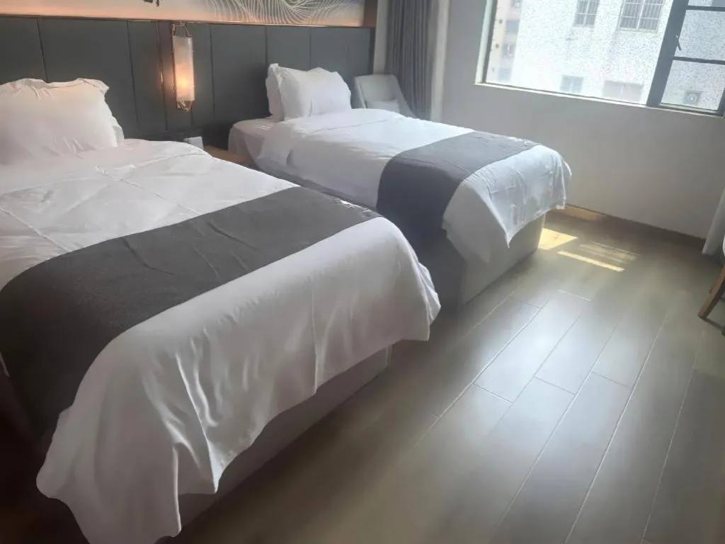 Bed in Gya Hotel Zhuhai International Airport New Town