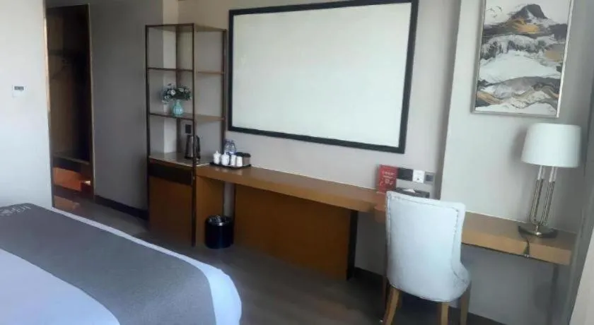 Bed in Gya Hotel Zhuhai International Airport New Town