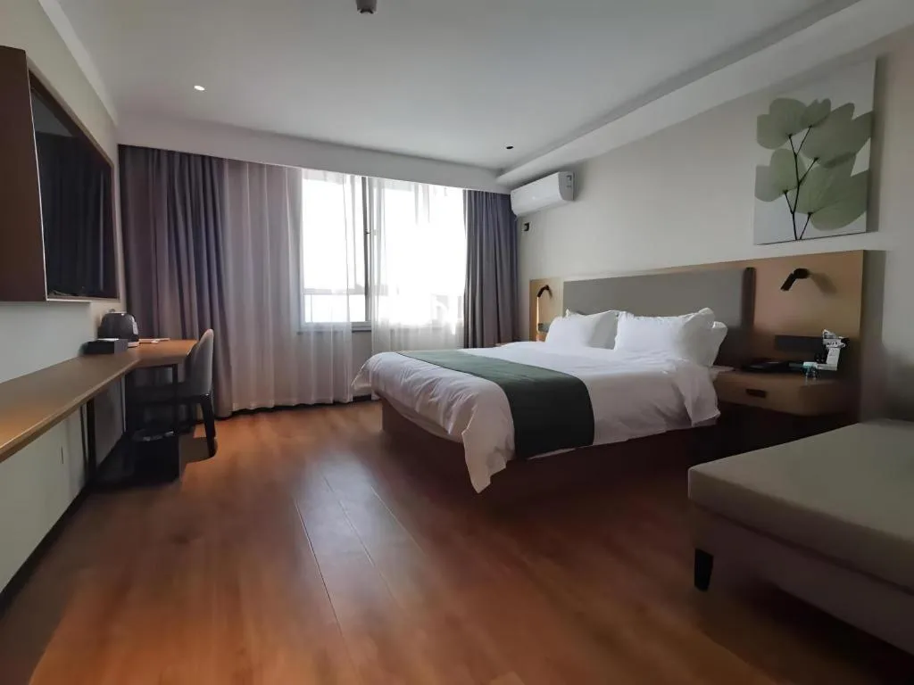 Bed in Green Tree Inn Luoyang Fenghuang Mansion Mudan Square Metro Station