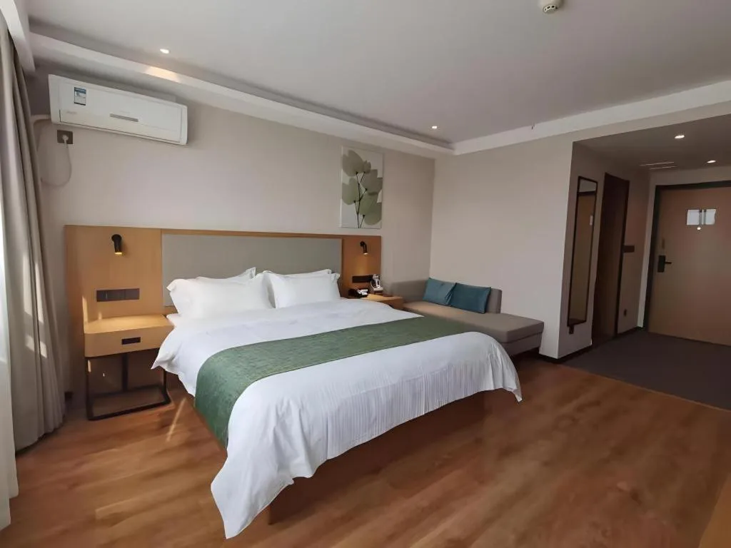 Bed in Green Tree Inn Luoyang Fenghuang Mansion Mudan Square Metro Station