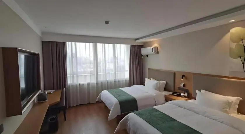 Bed in Green Tree Inn Luoyang Fenghuang Mansion Mudan Square Metro Station