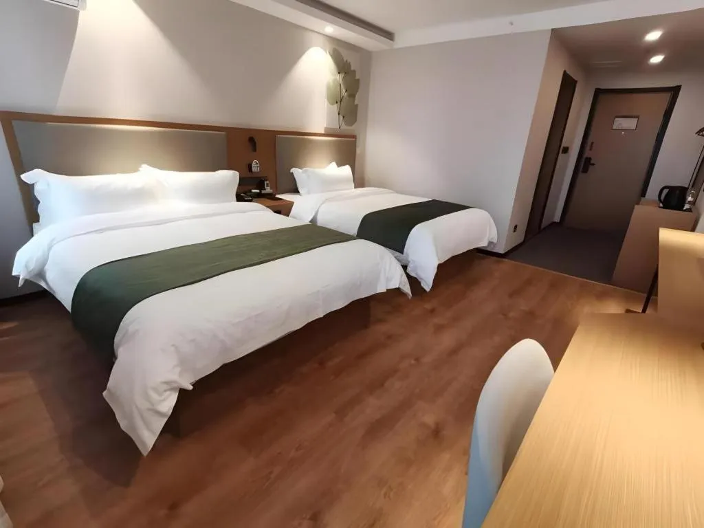 Bed in Green Tree Inn Luoyang Fenghuang Mansion Mudan Square Metro Station