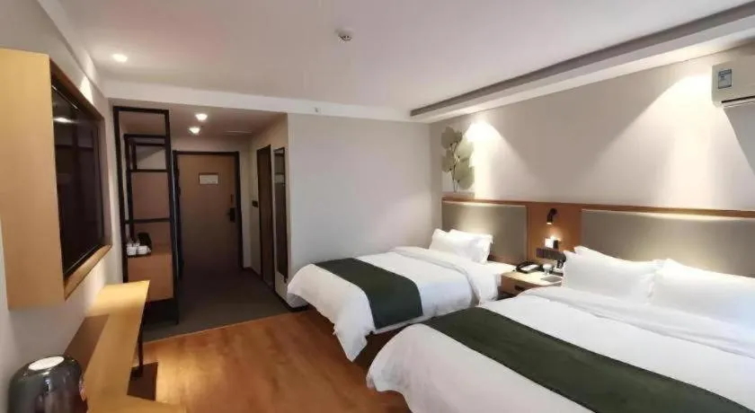 Bed in Green Tree Inn Luoyang Fenghuang Mansion Mudan Square Metro Station