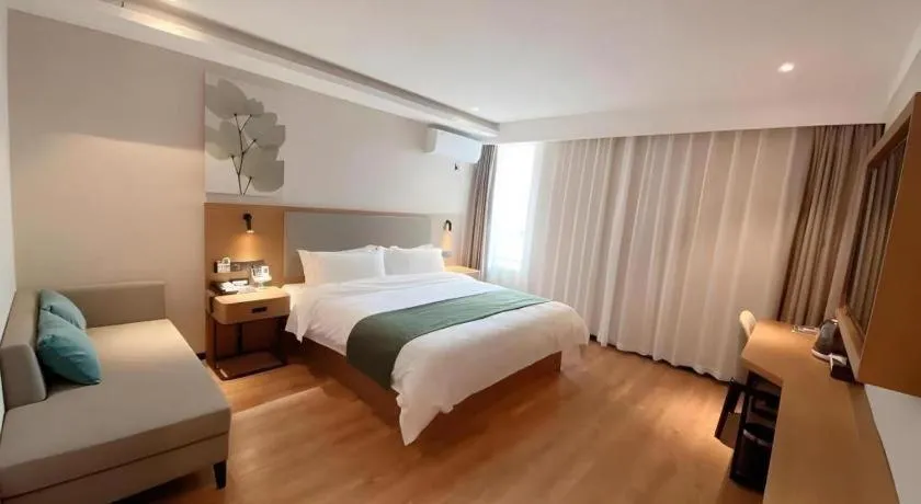 Bed in Green Tree Inn Luoyang Fenghuang Mansion Mudan Square Metro Station