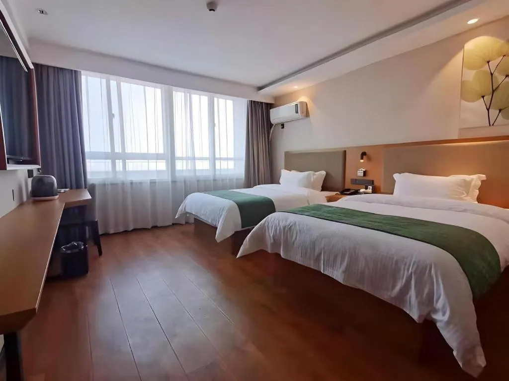 Bed in Green Tree Inn Luoyang Fenghuang Mansion Mudan Square Metro Station