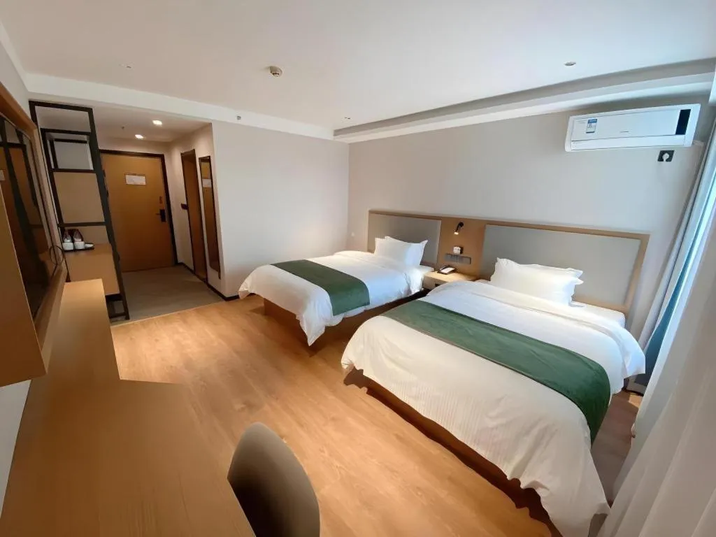 Bed in Green Tree Inn Luoyang Fenghuang Mansion Mudan Square Metro Station