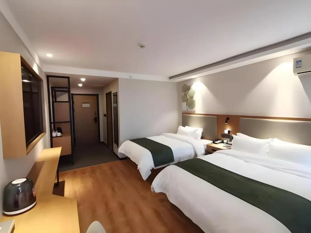 Bed in Green Tree Inn Luoyang Fenghuang Mansion Mudan Square Metro Station
