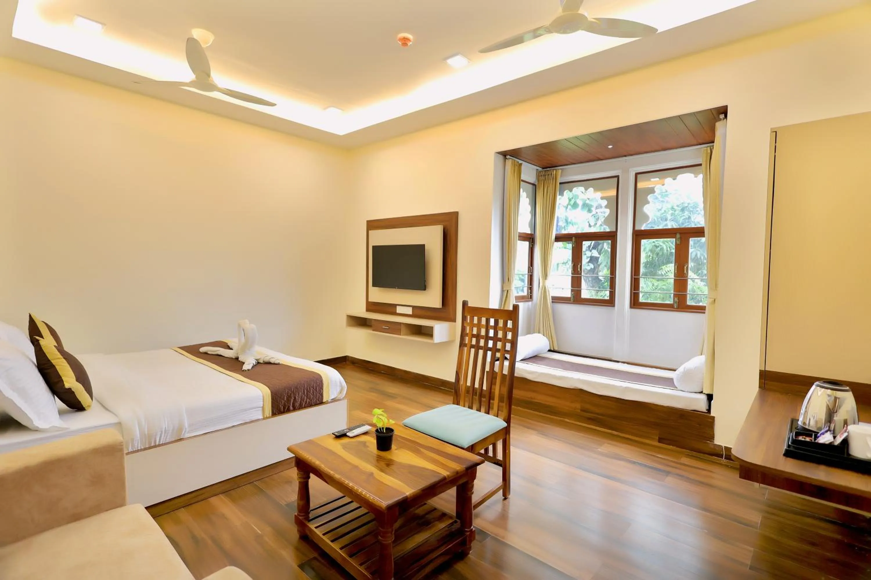 Bed in Manas Resort by Rudrakshi