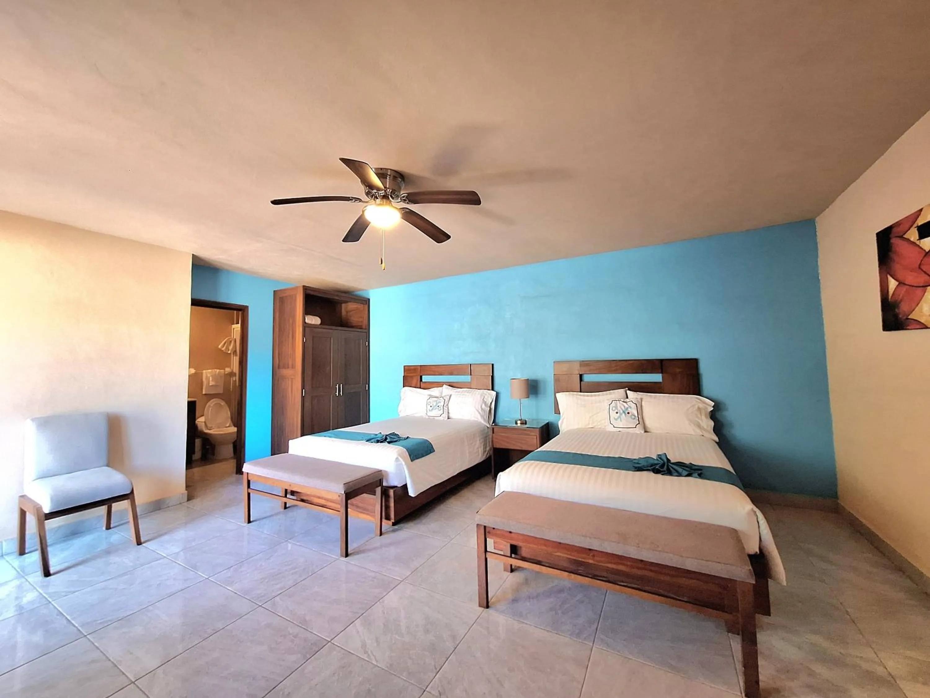 Bed in Pacific Inn hotel