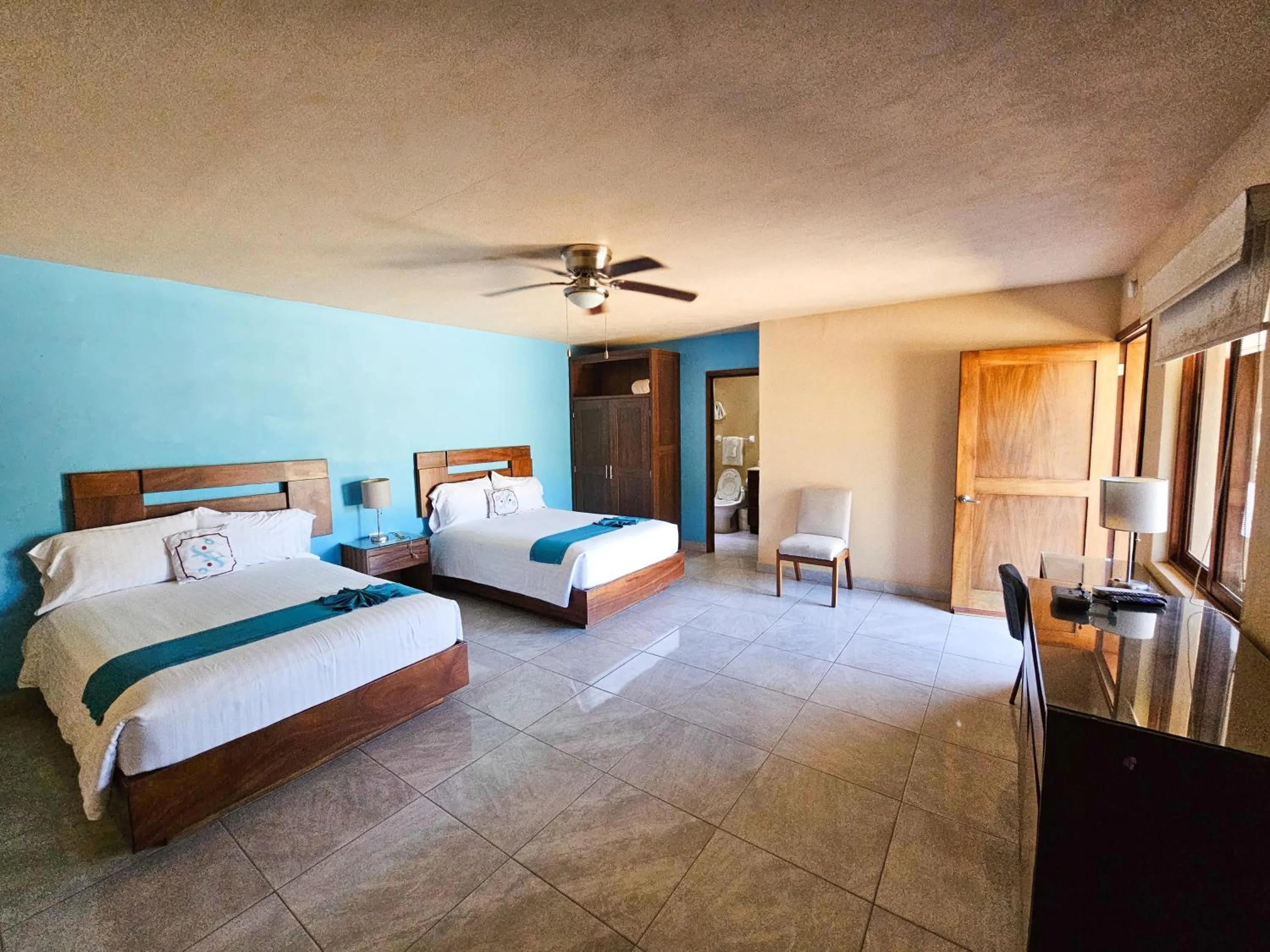 Bed in Pacific Inn hotel