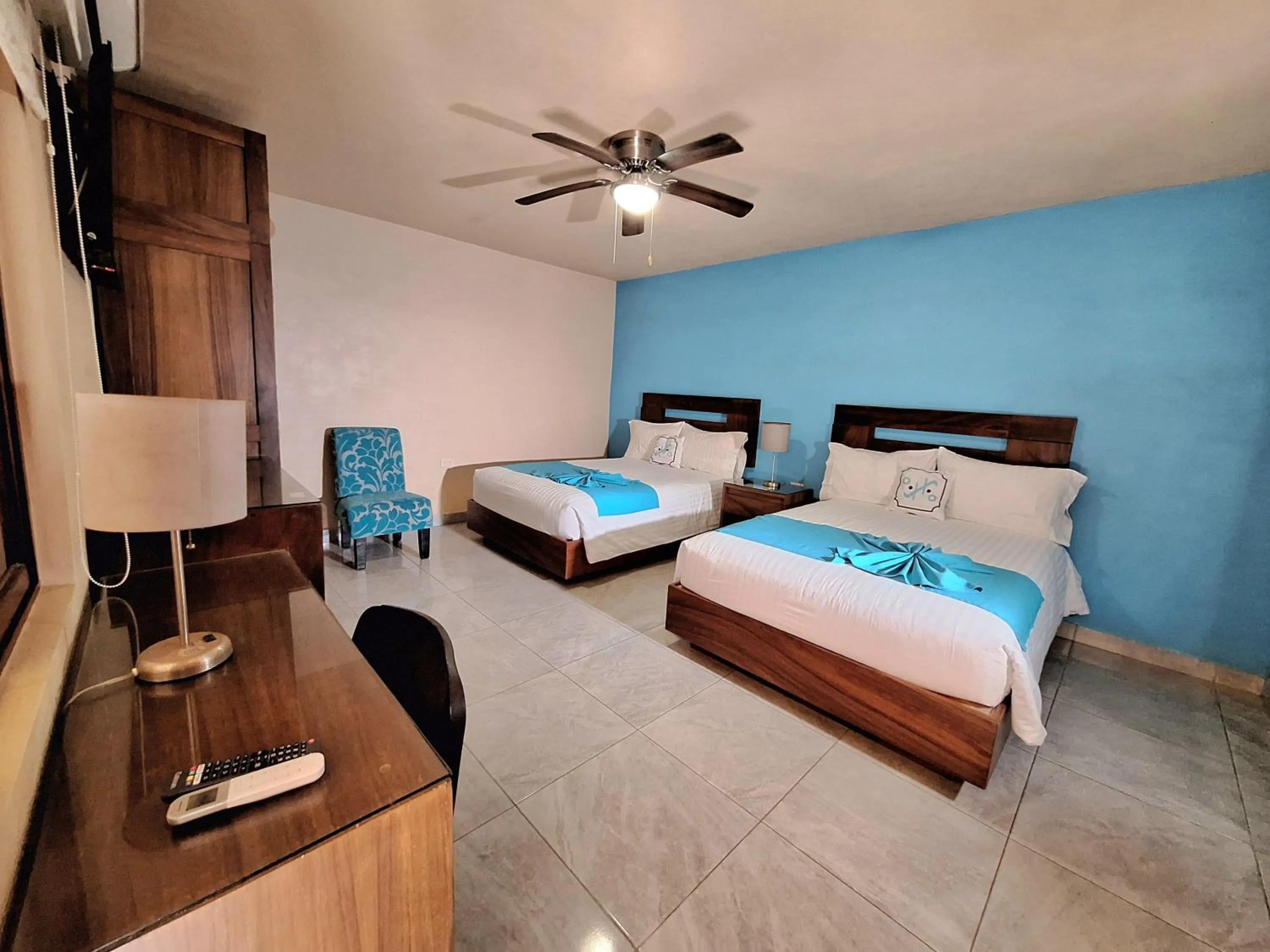 Bed in Pacific Inn hotel