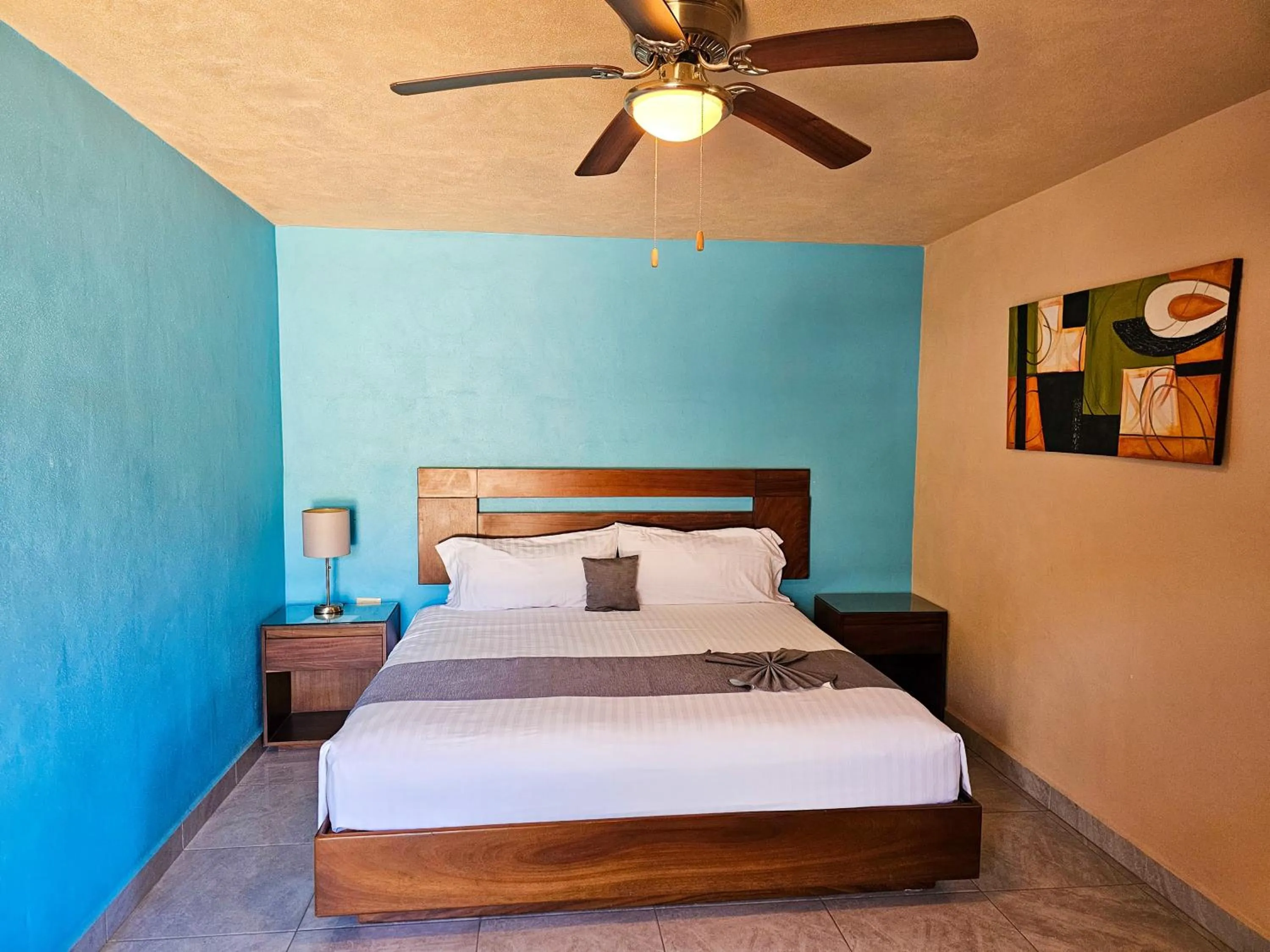 Bed in Pacific Inn hotel