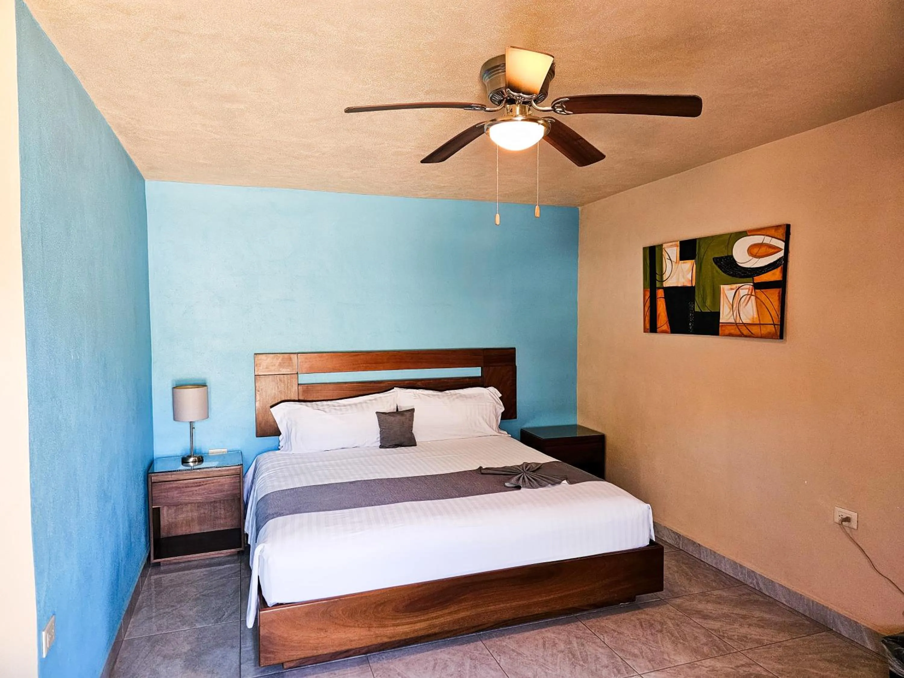 Bed in Pacific Inn hotel