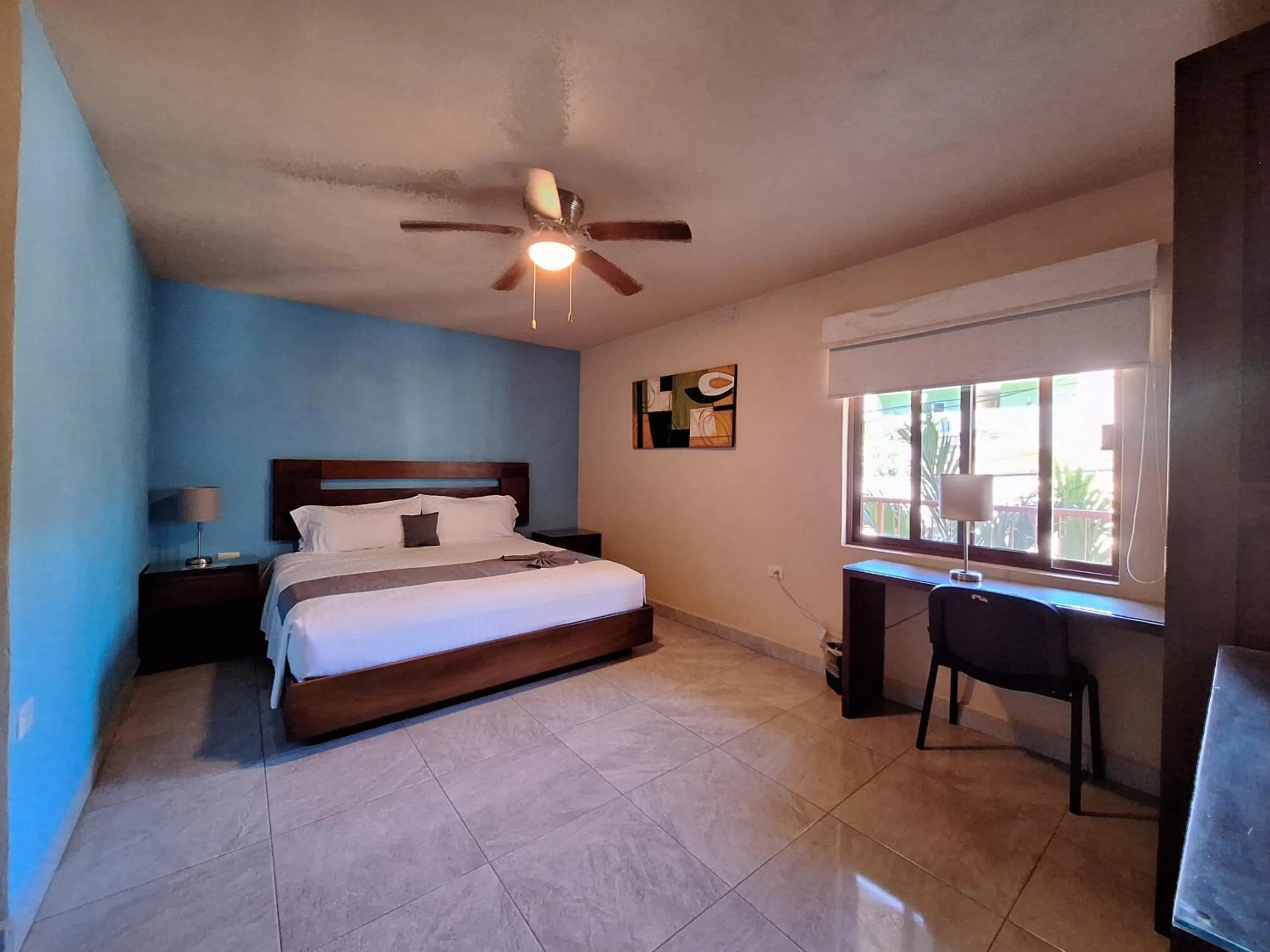 Bed in Pacific Inn hotel