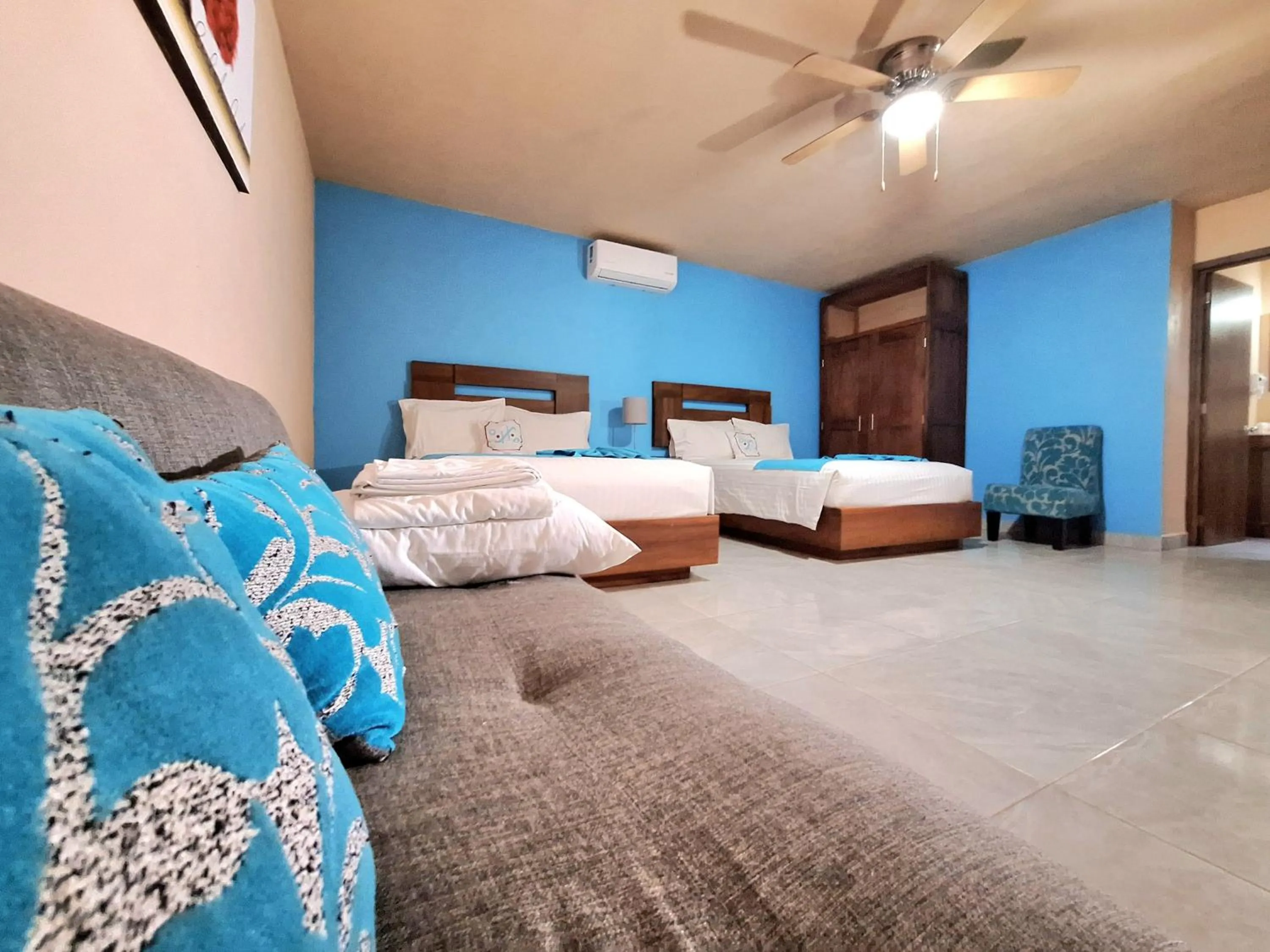 Bed in Pacific Inn hotel