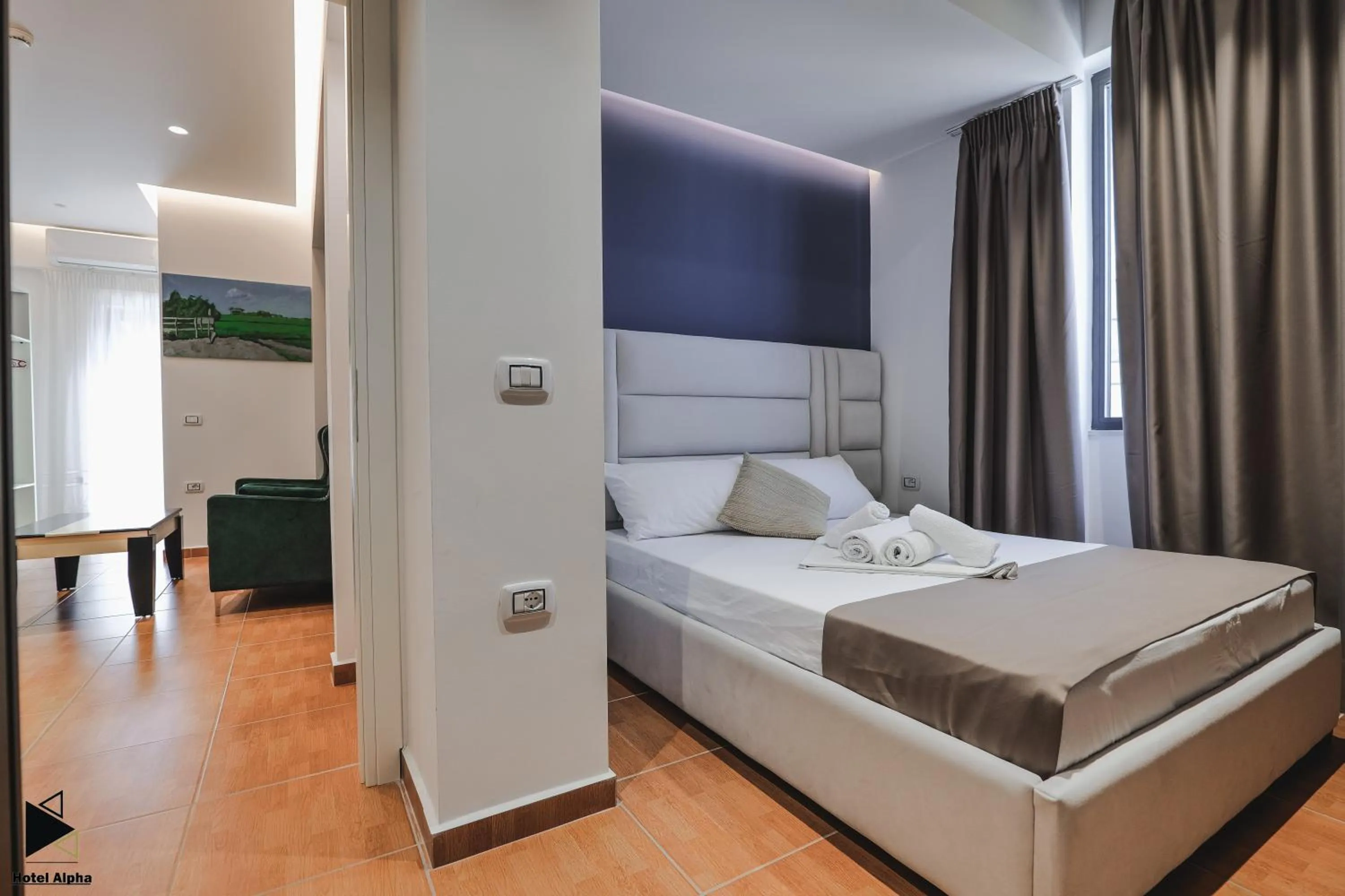 View (from property/room), Bed in Hotel Alpha