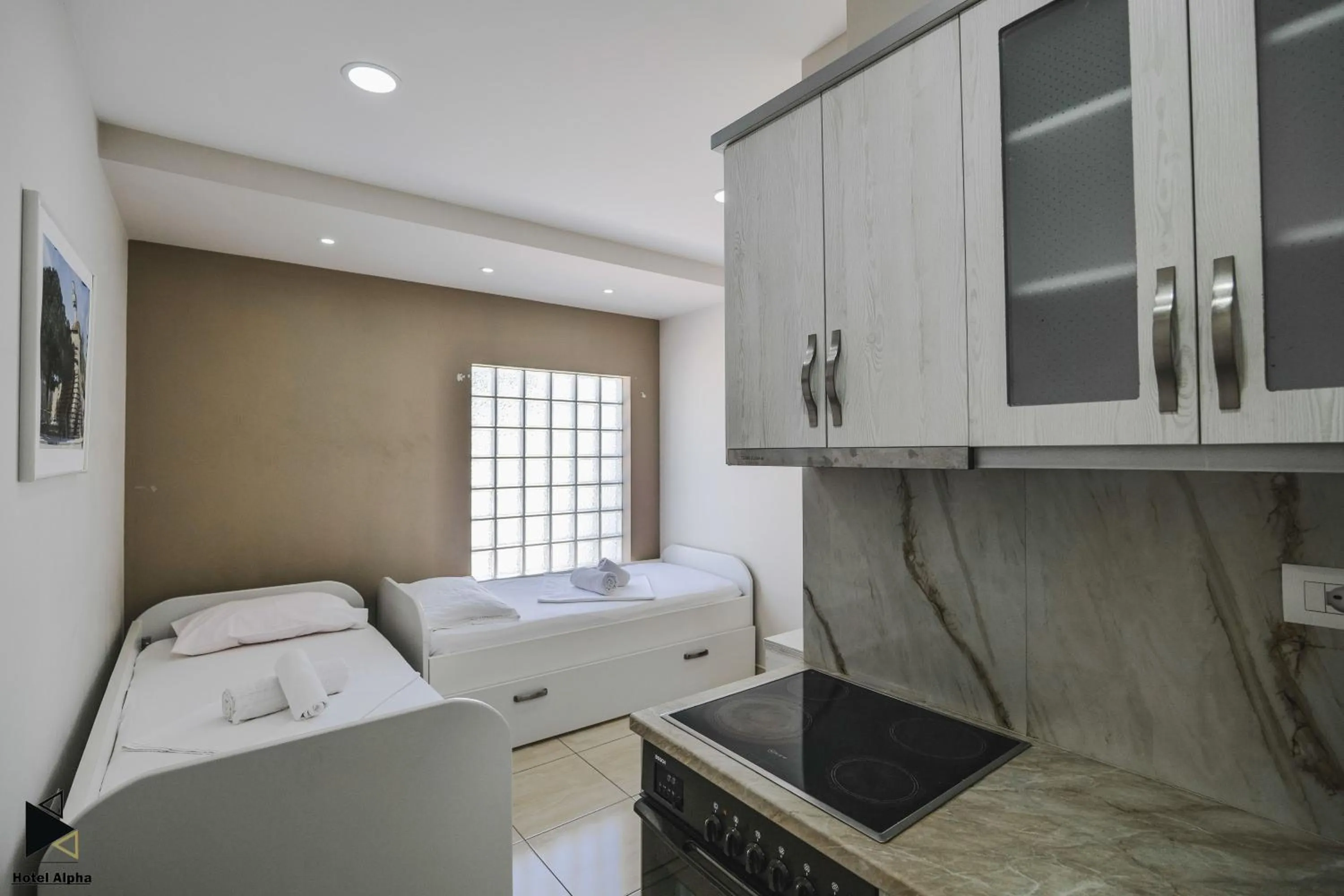 View (from property/room), Bed in Hotel Alpha