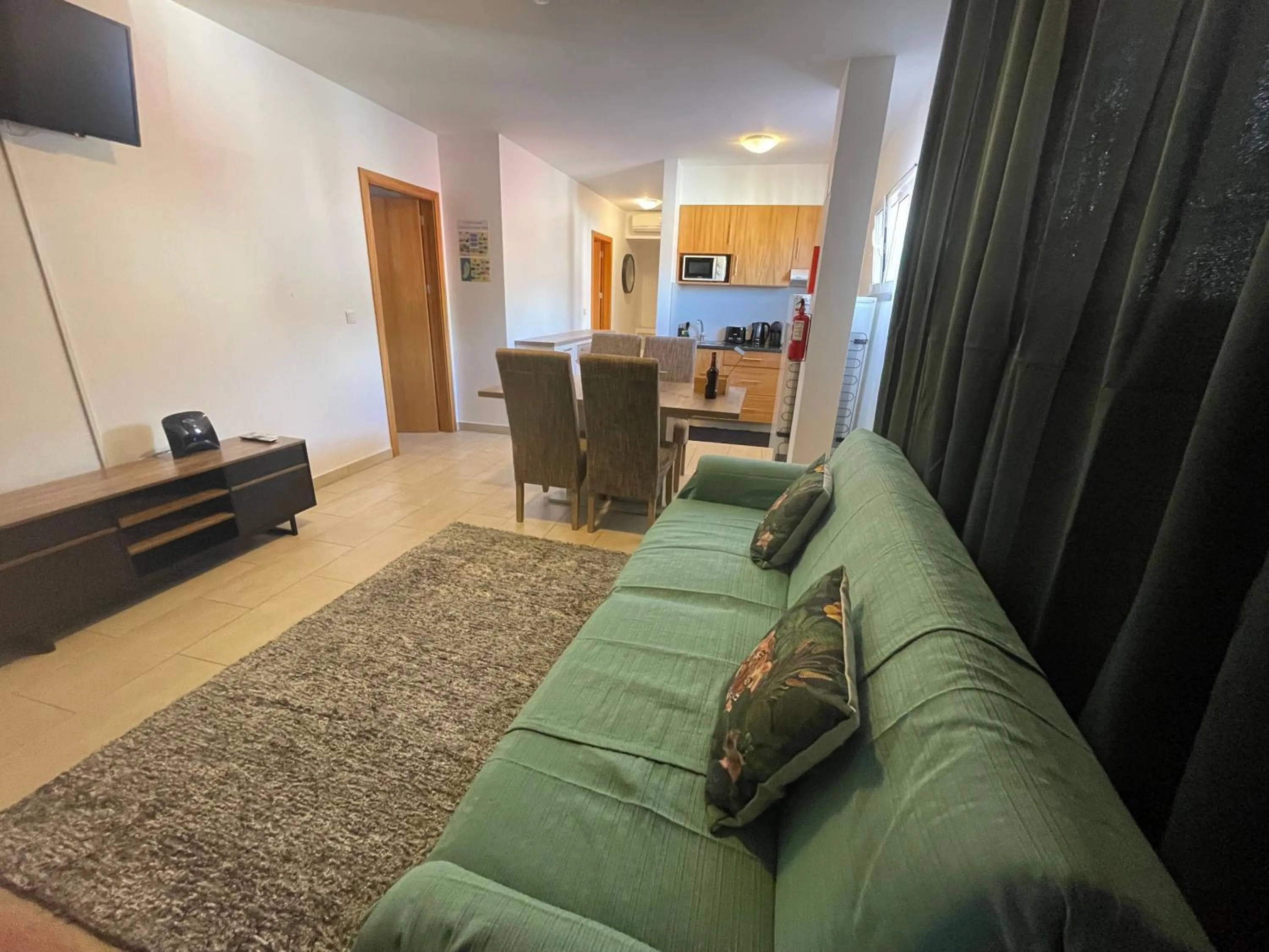 Living room in Esmeralda Holidays Apartments